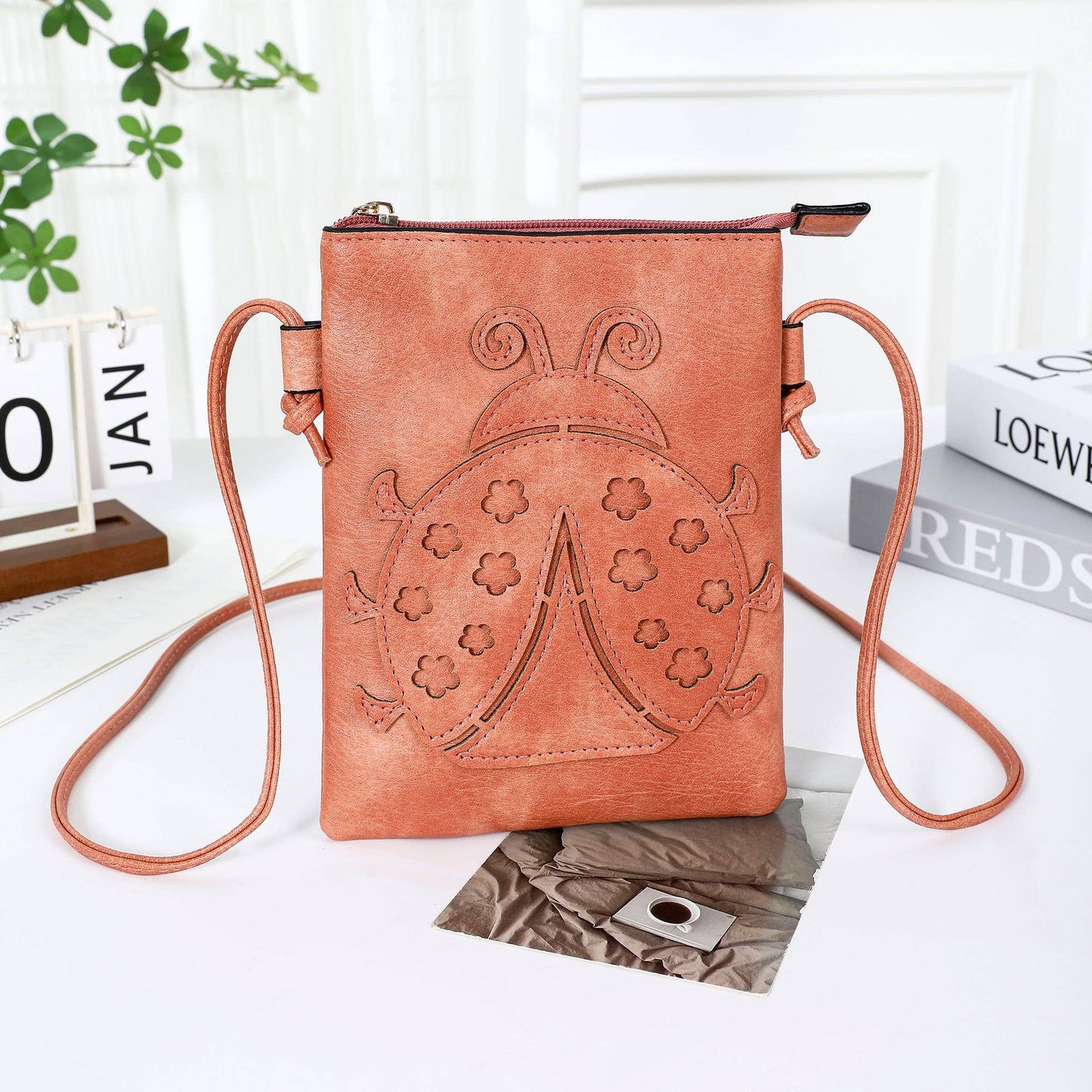 Shine Mark Accessories - Coral - Ladybug laser cut crossbody cellphone bag