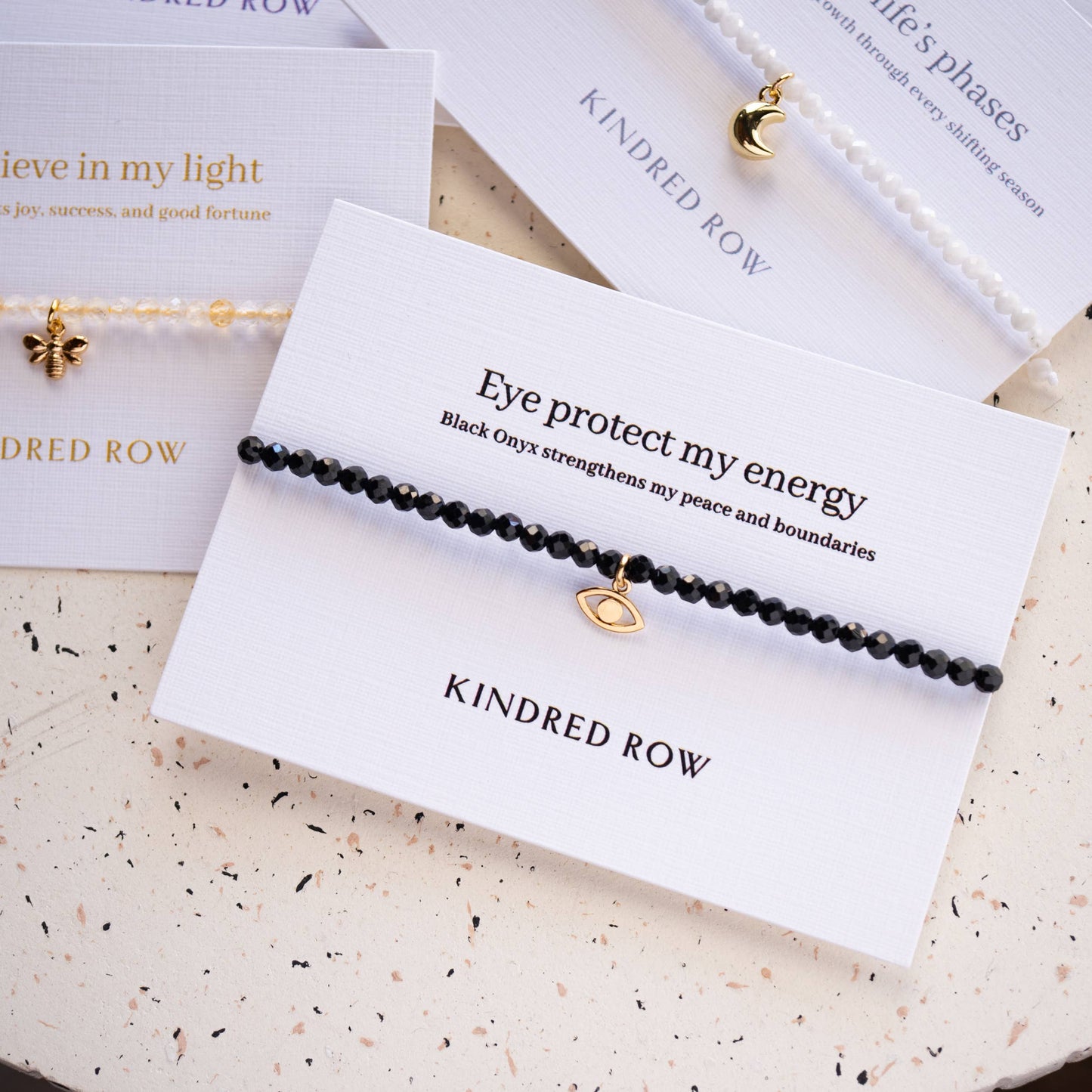 Kindred Row - Black Onyx Evil Eye Affirmation Charm Bracelet